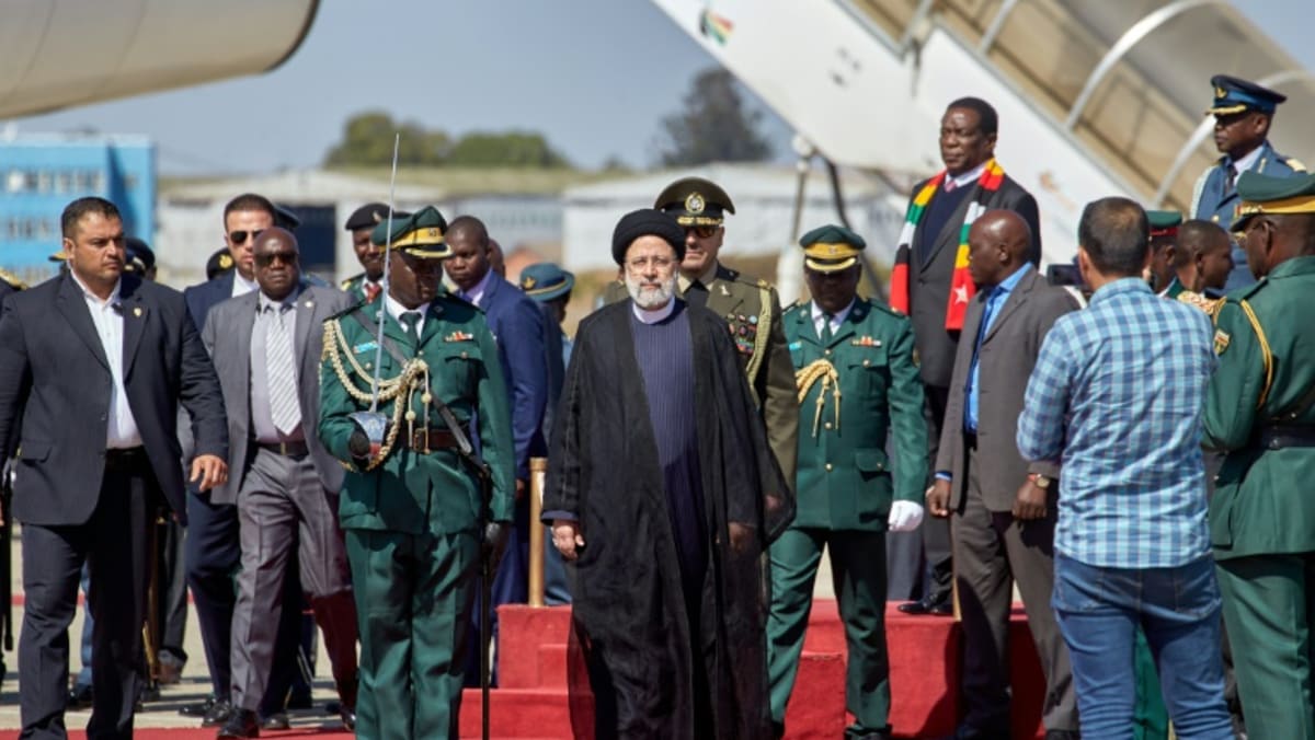 Iran's Raisi visits fellow outlier Zimbabwe ahead of key vote